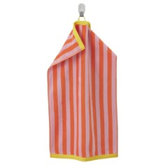 an orange and white striped towel hanging on a hook