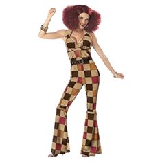 a woman in a checkered jumpsuit with red hair