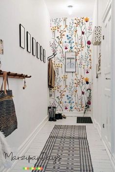 the hallway is decorated in white and black