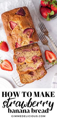 a loaf of strawberry banana bread sitting on top of a white table next to strawberries