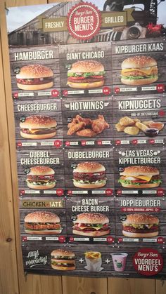 the menu for burgers is displayed on a wooden wall