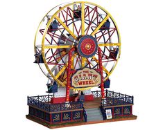 an amusement park ferris wheel with people on it's sides and the sign for the county of wheels