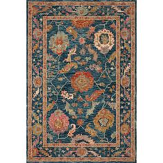 a blue rug with flowers and leaves on the bottom, in an ornate frame around it