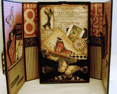 an open book with butterflies and numbers on the pages, inside is a photo album