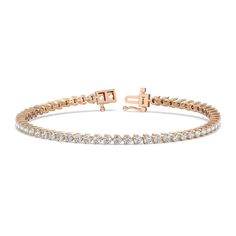 This beautifully simple and elegant tennis bracelet shimmers as you move. Set with a single row of brilliant cut diamonds within elegant three-prong baskets for a minimal metal appearance. Gorgeous Engagement Ring, Diamond Tennis Bracelet, Tennis Bracelet Diamond, Tennis Bracelet, Lab Diamonds, Diamond Earrings Studs, High Quality Jewelry, Brilliant Cut Diamond, Diamond Studs