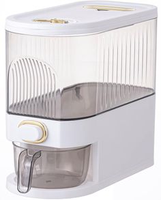 a white coffee maker with gold trimmings on the top and bottom part, in front of a white background