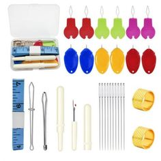 an assortment of sewing tools including needle tips, thread markers and measuring tape are shown