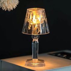 a lamp that is on top of a table