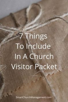 a package wrapped in brown paper with the words 7 things to include in a church visitor packet