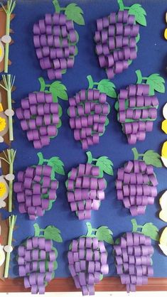 the grapes are made out of fondant and then cut into smaller pieces