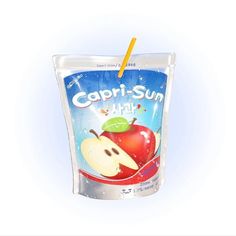 an apple yogurt with a straw sticking out of it's wrapper