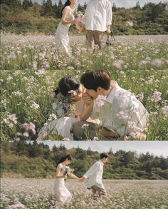 two people kneeling in a field with flowers and one person holding the other's hand