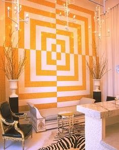 a living room with zebra print rugs and chairs