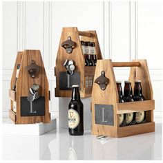 three wooden wine racks with bottles and openers