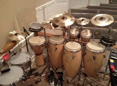 a bunch of drums that are sitting on the floor