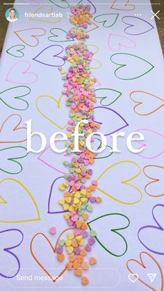 a long table with hearts and confetti on it