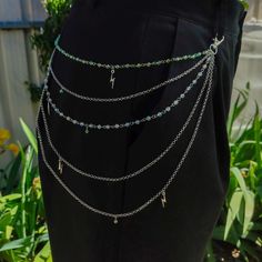 These belt chains are made from crystal, glass, and plastic beads and are durable for everyday wear. They are also made to fit everyone, no matter their size, and upgrade any outfit, whether for a concert, rave, or everyday wear! Belts Aesthetic, Belt Chains, Chain Clothes, Belt Chain, Suspender Belt, Plastic Beads, Suspenders, Crystal Glass, Everyday Wear