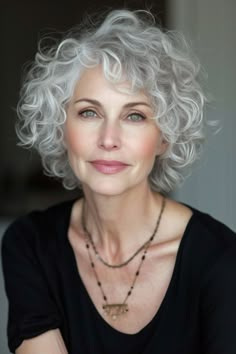 The curly tapered haircut, adorned with silver streaks, is a stylish and modern choice for women over 60. The silver accents bring a touch of elegance to the curls, perfect for a chic and graceful look. White Short Curly Hair, Shorter Layered Haircuts, Mane Magic, Boys Hairstyles, Hairstyle Tips, Short Silver Hair, Hairstyles Prom