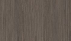 a close up view of the wood grains on this wallpapered surface, which is very dark brown