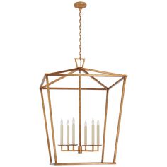 a brass lantern with six candles hanging from the bottom and one light fixture on top