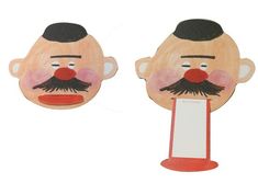 two paper cutouts of a man's head with a red nose and moustache