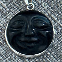 Carved “ Man In The Moon” Face Onyx And Sterling Pendant Spiritual Jewelry With Oxidized Oval Pendant, Moon Face Jewelry, Black Sterling Silver Moon Necklaces, Black Moon-shaped Sterling Silver Necklace, Spiritual Moon Shaped Nickel-free Necklace, Moon Face, Silver Moon, Black Silver, Womens Jewelry Necklace