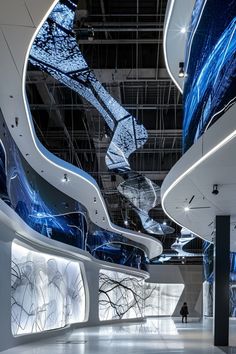 the interior of an office building with blue and white designs