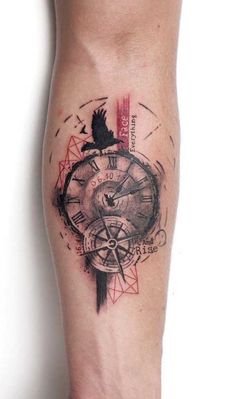 a tattoo on the leg of a person with a compass and bird in its center