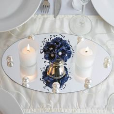 the table is set with candles, plates and silverware for $ 8 99 each