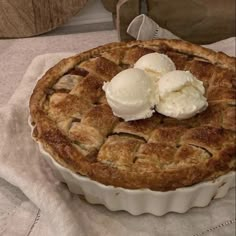 an apple pie with ice cream on top