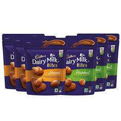 six bags of dairy milk with almonds