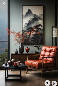 a living room filled with furniture and a painting on the wall