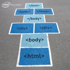 the words are written in different languages on the pavement, along with an arrow pointing to each other