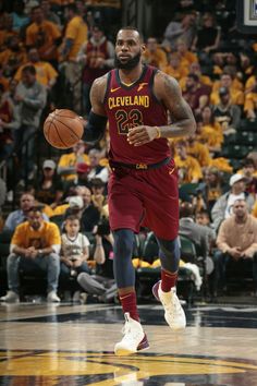 cleveland basketball player dribbling the ball during a game