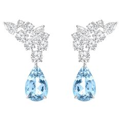 Inspired by the JOY of experiencing a gushing waterfall, these stunning earrings from the Cascade Collection features 4 pear-cut diamond, 14 round cut colorless diamonds and 2 pear aquamarine. These dressy earrings are perfect for the festive season! Wear these with a sparkly sequin dress. Accompanied with a total of 5 1/3 Carat gemstones, these earrings will be delivered in a HARAKH jewelry box along with a HARAKH authentication certificate and a reflection card. Drawing from a century of exper Luxury Light Blue Fine Jewelry Earrings, Sparkly Sequin Dress, Lux Jewelry, Dressy Earrings, Diamond Chandelier Earrings, Luxe Jewelry, Aquamarine Earrings, Card Drawing, Colorless Diamond