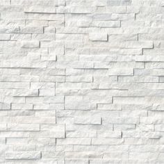 a white brick wall is shown in this image