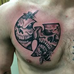 a man's chest with a skull and cross tattoo on his chest, while the other half has a fish in it