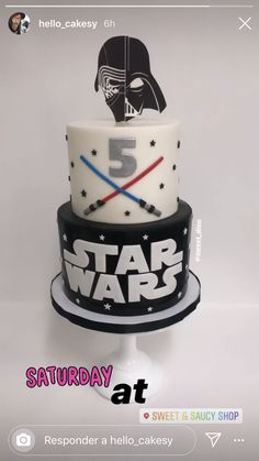 a star wars themed cake with darth vader on top