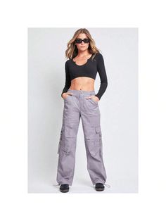 Add style, comfort, and versatility to your pant collection with our women's elastic waist cargo pants. This relaxed-fit cargo pant is constructed with lightweight cotton fabric for maximum comfort and versatility. Our cargo pants for women have a relaxed leg, baggy fit from hip to hem, and are full-length with a drawstring hem for an option to wear open or tied for a cinched ankle. Detailed with two classic side patch front pockets, and two ring closure front and back pockets these cargo pants Cotton Cargo Jeans In Straight Fit, Trendy Full Length Cotton Cargo Jeans, Trendy Wide Leg Cotton Cargo Pants, Trendy Cotton Wide Leg Cargo Pants, Trendy Relaxed Fit Cargo Pants With Side Pockets, Trendy Baggy Cotton Cargo Pants, Trendy Wide Leg Cargo Pants With Relaxed Fit, Cotton Cargo Pants With Multiple Pockets For Fall, Full Length Cotton Cargo Jeans For Fall