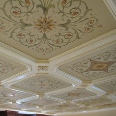 the ceiling is decorated with intricate designs