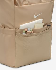 a bag with some items in it that is inside the back pocket and attached to another bag