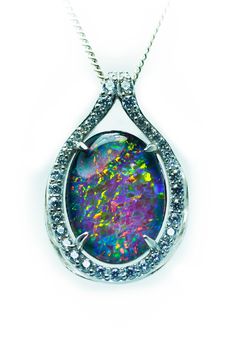 Thank you for visiting our online shop, here we make and handcraft our opal jewelleries   About this opal:  *This is a genuine Australian triplet opal jewelry piece, its stone raw materials sourced from Lightning Ridge or Coober Pedy, our famous opal mining towns.  *It is a beautiful opal jewelry piece with multi colour reflection, especially under the sun light. Opals are all about color.  Genuine opal shows different color patterns under various light conditions. Color pattern also changes whe Opal Necklace Pendant, Opal Jewelry Necklace, Australian Opal Jewelry, Jewelry Vendor, Womens Silver Jewelry, Fire Opal Necklace, Opal Pendant Necklace, Coober Pedy, Opal Pendants