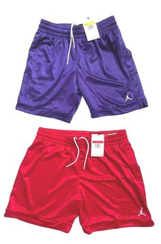 Elevate your activewear game with these designer women's basketball shorts from Air Jordan. The shorts come in a solid Purple shimmer or Red shimmer and feature an elastic waist with drawstring closure for a comfortable fit. The 100% polyester fabric is machine washable and has a silky texture for added comfort The Air Jordan Basketball Training Shorts have a relaxed fit The garment care is easy, and the shorts are perfect for all seasons - winter, summer, fall, and spring. We also have a large variety of basketball tops for women in Nike & the Air Jordan brand Create your sets today. *NOTE Top not included in price, check it out in our Basketball tops listing! Shop with confidence, 100% authentic designer brand merchandise guaranteed, great prices and returns accepted Thank you for lookin Basketball Shorts Women Outfit Aesthetic, Basketball Shorts Women Outfit, Air Jordan Women, Womens Basketball Shorts, Jordan Women, Brand Merchandise, Air Jordans Women, Seasons Winter, Jordan Basketball