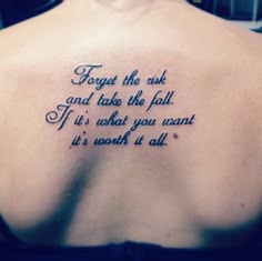 a person with a tattoo on their back that says, forget the uk and take the fall if it's what you want it all