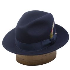 DelMonico Untouchable Fedora Hat by Capas Classic Blue Hats With Curved Brim, Classic Blue Hat With Curved Brim, Wide Brim Wool Felt Hat, Classic Flat Bill Hats For Kentucky Derby, Fitted Fur Felt Panama Hat With Curved Brim, Formal Flat Bill Felt Hat For Kentucky Derby, Classic Fedora With Flat Bill For Formal Occasions, Classic Blue Brimmed Felt Hat, Classic Fitted Blue Hat