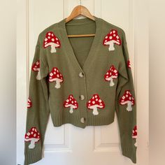 Cute Cardigan With Mushroom Details. Unsure Of The Brand, But It’s New Without Tags. Slightly Cropped, Boxy Fit, Fits Like An Xs/S. Cute Button-up Cardigan For Fall, Cute Button-up Fall Cardigan, Cute Green Fall Cardigan, Knit Mushroom, Mushroom Things, Mushroom Clothes, Mushroom Cardigan, Unique Cardigan, Vintage Christmas Sweaters