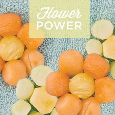 oranges and lemons on a towel with the words flower power written above them