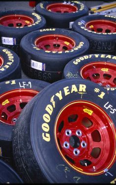 many tires are lined up in rows for sale