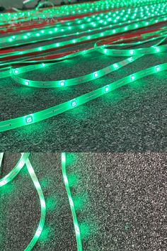 the green lights are glowing on the floor next to the computer keyboard and mouse pad