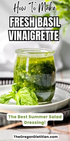 fresh basil vinaigrette in a glass jar on a white plate with text overlay how to make fresh basil vinaigreate the best summer salad dressing